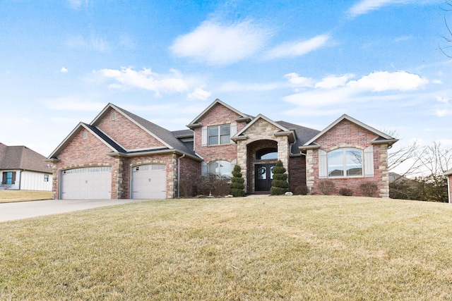 view of front of property with an attached garage, driveway, a front lawn, and brick siding