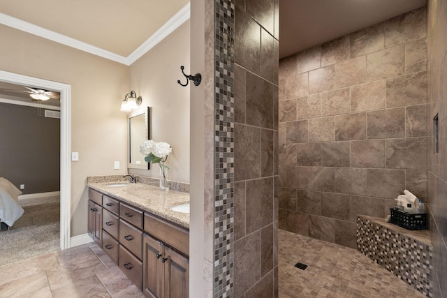 full bathroom featuring double vanity, visible vents, ornamental molding, a sink, and baseboards