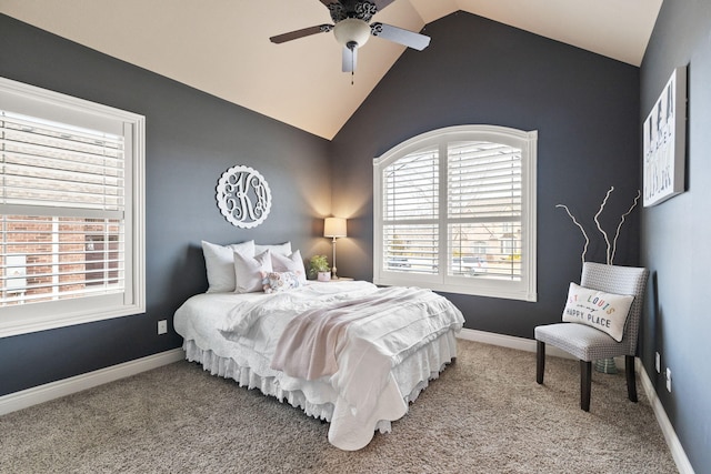 bedroom featuring lofted ceiling, ceiling fan, carpet, and baseboards