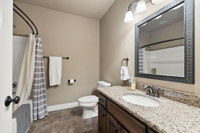 bathroom featuring shower / bathtub combination with curtain, vanity, toilet, and baseboards