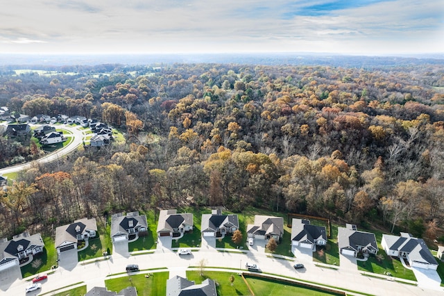 aerial view featuring a residential view and a view of trees