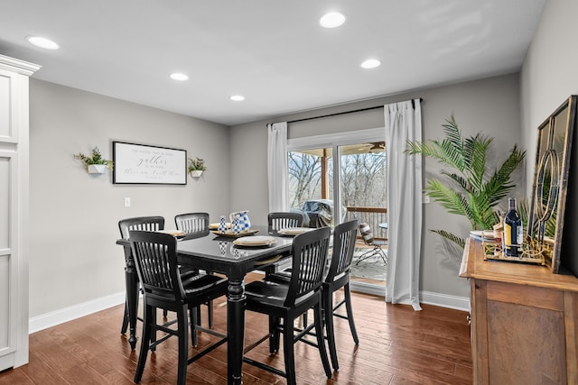 dining space with recessed lighting, dark wood finished floors, and baseboards