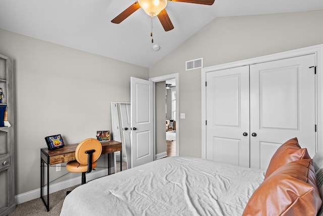 carpeted bedroom featuring baseboards, visible vents, a ceiling fan, vaulted ceiling, and a closet