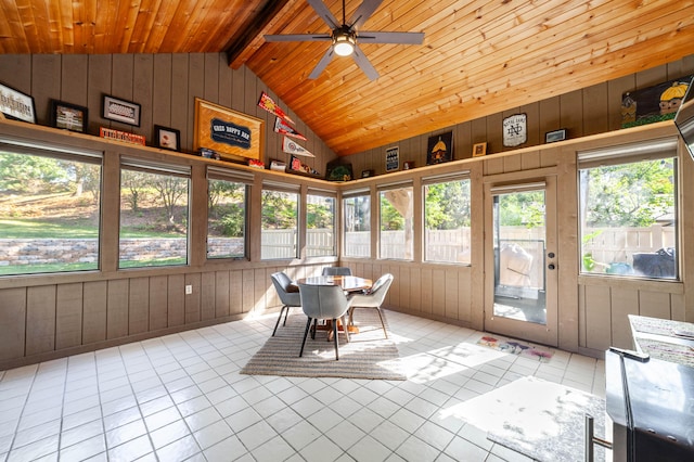 unfurnished sunroom with vaulted ceiling with beams, wood ceiling, and a ceiling fan