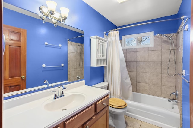 full bathroom featuring tile patterned flooring, shower / tub combo with curtain, vanity, and toilet