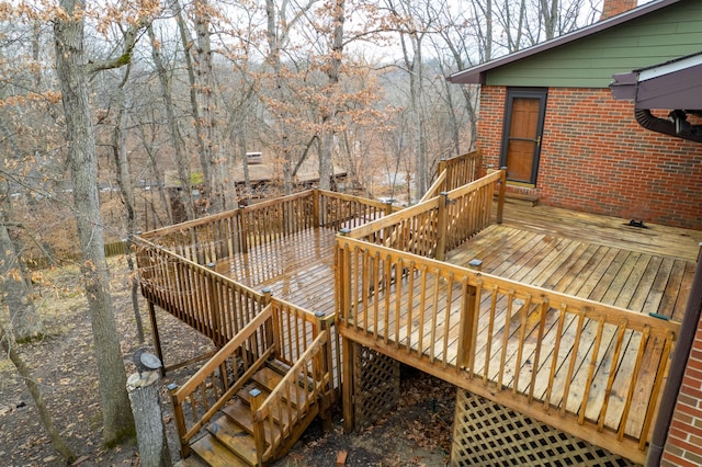 wooden terrace featuring stairway