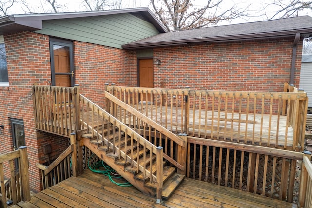 deck featuring stairs