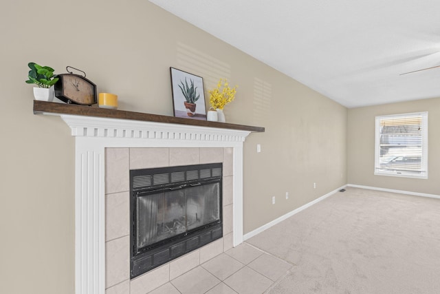 details with carpet, baseboards, and a tile fireplace