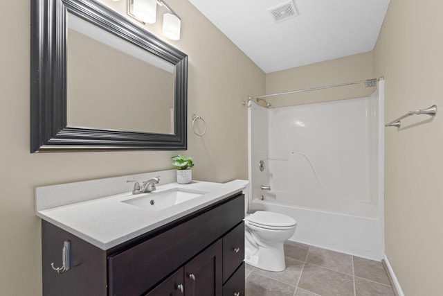 full bathroom with visible vents, toilet, washtub / shower combination, vanity, and tile patterned floors