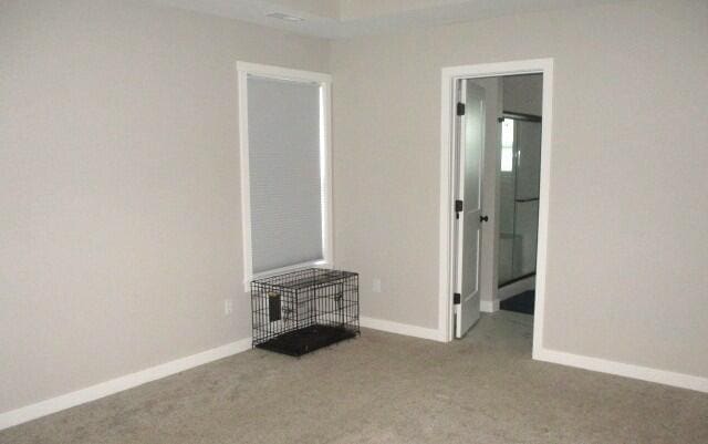 305 E Francis St, Sturgeon, MO 65284 - spare room featuring carpet flooring and baseboards