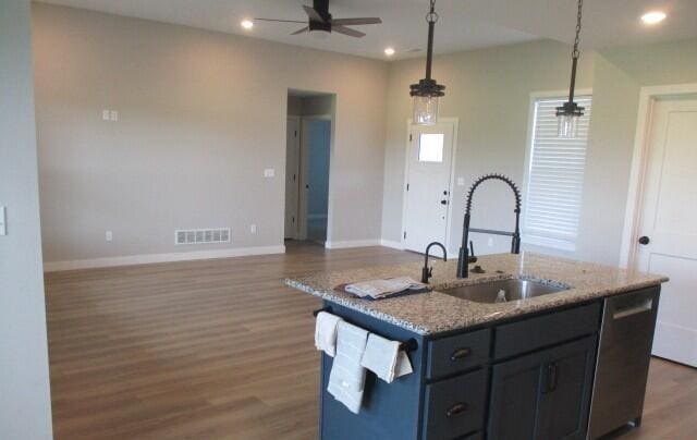305 E Francis St, Sturgeon, MO 65284 - kitchen featuring a sink, ceiling fan, dark wood finished floors, baseboards, and recessed lighting