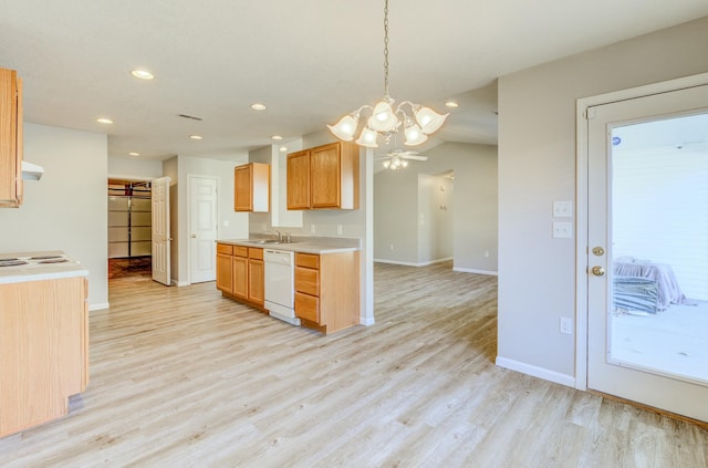 kitchen with pendant lighting, light countertops, light brown cabinetry, light wood-type flooring, and dishwasher