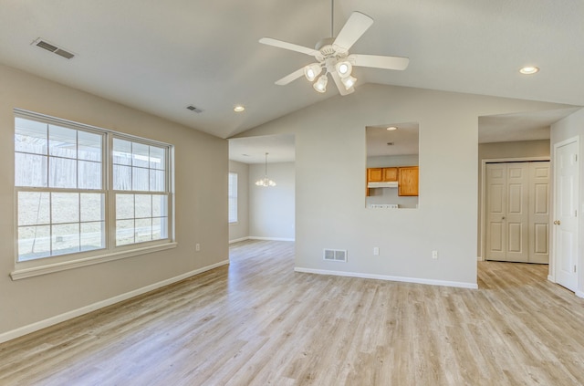 unfurnished living room with light wood finished floors, baseboards, and visible vents