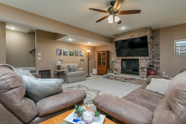 living area featuring carpet floors, recessed lighting, a fireplace, and a ceiling fan