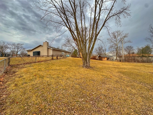 view of yard featuring fence