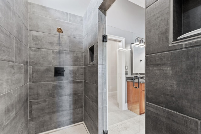 full bath featuring a shower stall and vanity