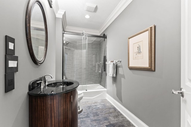 full bathroom featuring baseboards, toilet, shower / bath combination with glass door, crown molding, and vanity