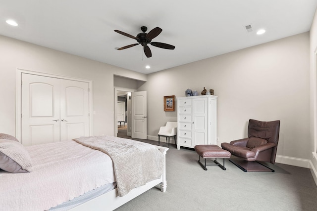 bedroom featuring ceiling fan, recessed lighting, baseboards, a closet, and dark carpet