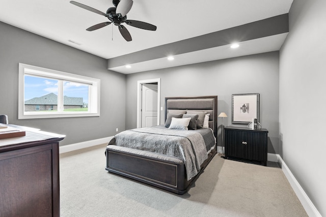 bedroom featuring light colored carpet, visible vents, baseboards, and recessed lighting