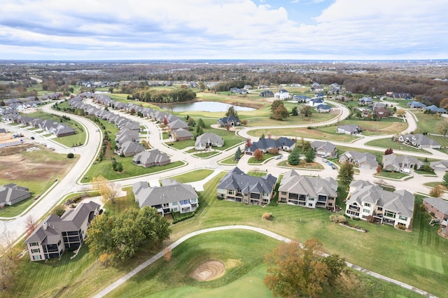 bird's eye view featuring a water view and a residential view