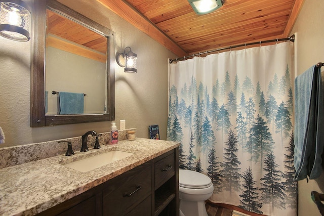 full bathroom with toilet, a textured wall, wood ceiling, and vanity