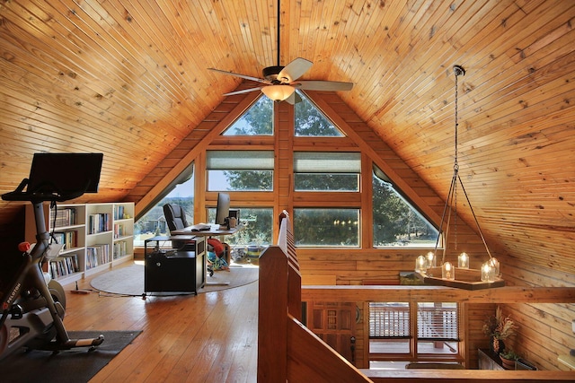 living area featuring wood walls, wood ceiling, vaulted ceiling, and hardwood / wood-style floors