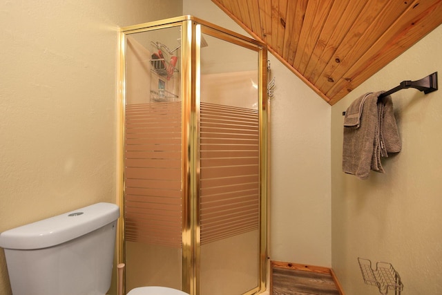 full bathroom with toilet, lofted ceiling, wood ceiling, wood finished floors, and a shower stall