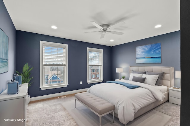 bedroom with recessed lighting, visible vents, baseboards, and light colored carpet