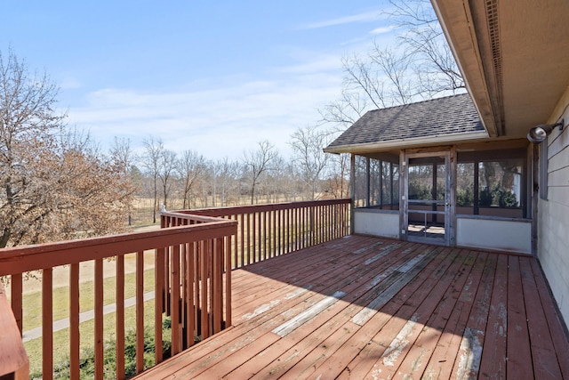 wooden terrace with a sunroom