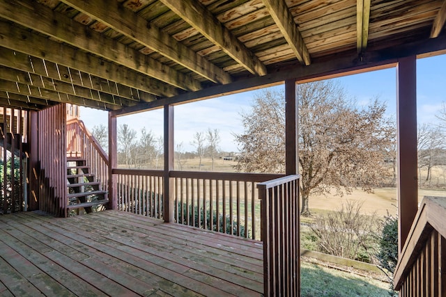 wooden deck featuring stairway