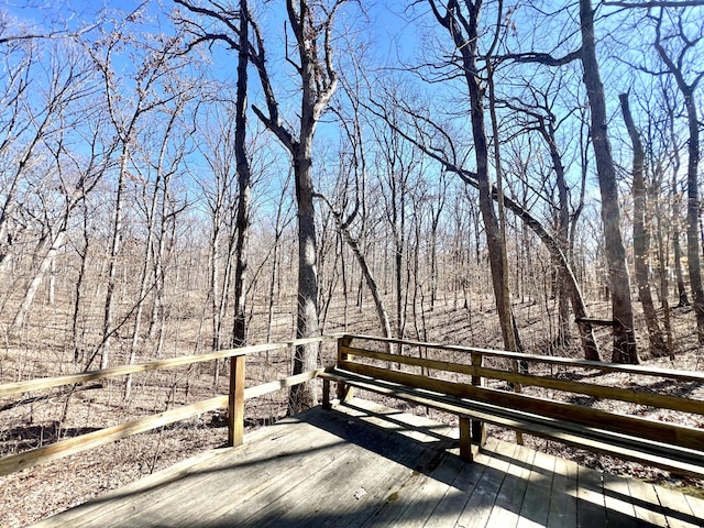 deck with a wooded view