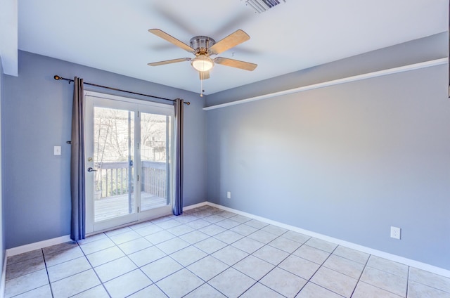 unfurnished room featuring visible vents, ceiling fan, baseboards, and light tile patterned floors