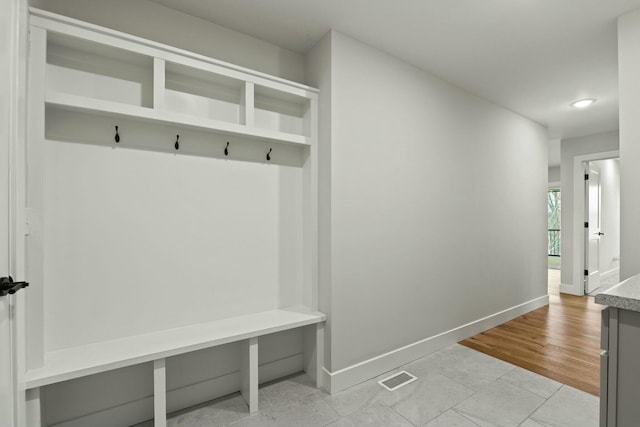 mudroom featuring baseboards and visible vents