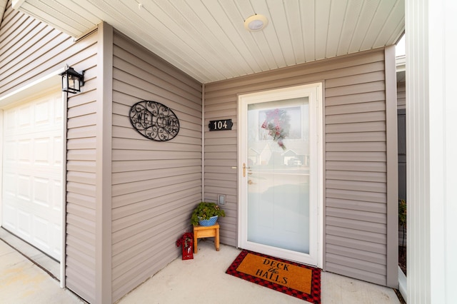 property entrance featuring a garage