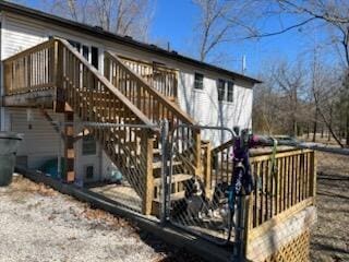 back of house with stairway and a wooden deck