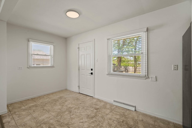 entrance foyer with visible vents and baseboards