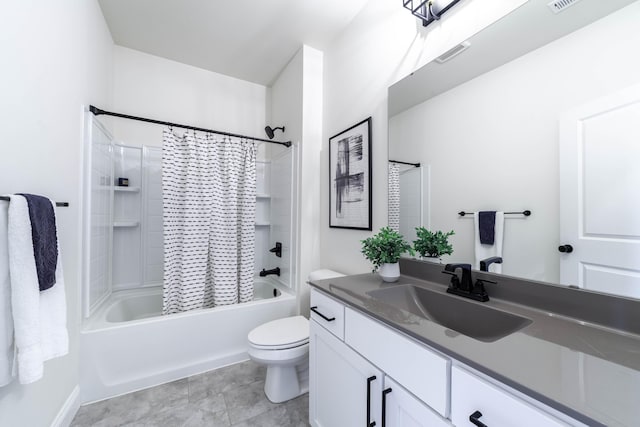 full bath with toilet, vanity, visible vents, and shower / tub combo with curtain