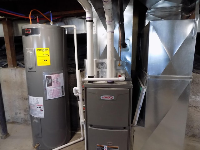 utility room with electric water heater