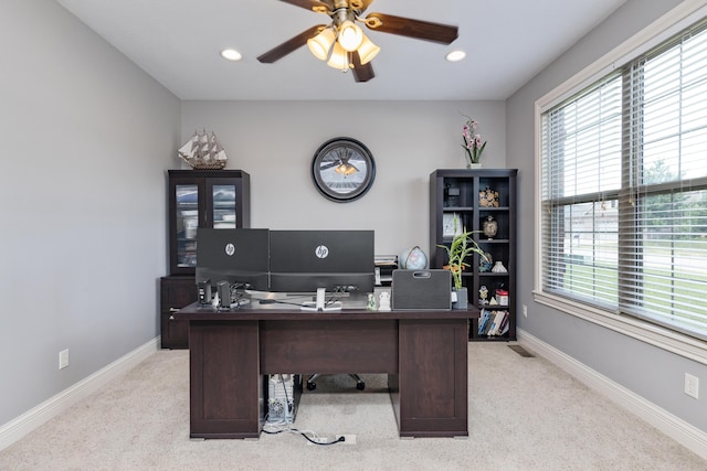 office space with baseboards, a ceiling fan, and recessed lighting