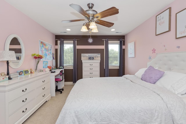 bedroom with ceiling fan, recessed lighting, and light colored carpet