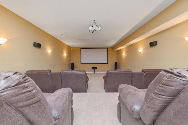 cinema with carpet and baseboards