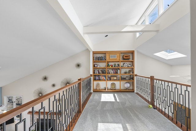 bonus room featuring carpet floors and vaulted ceiling with skylight