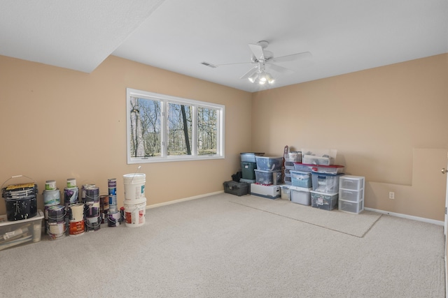 recreation room with baseboards, visible vents, ceiling fan, and carpet flooring