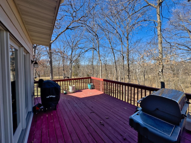 deck featuring a grill