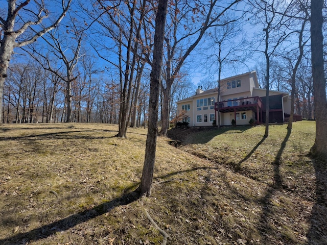 view of yard featuring a deck