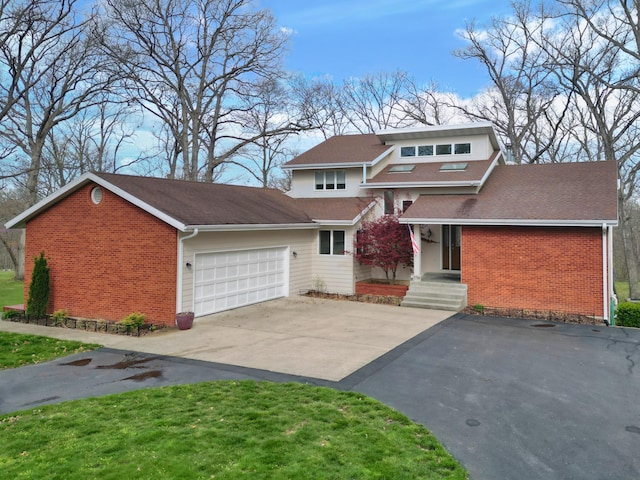 view of front of house featuring brick siding, driveway, a garage, and roof with shingles