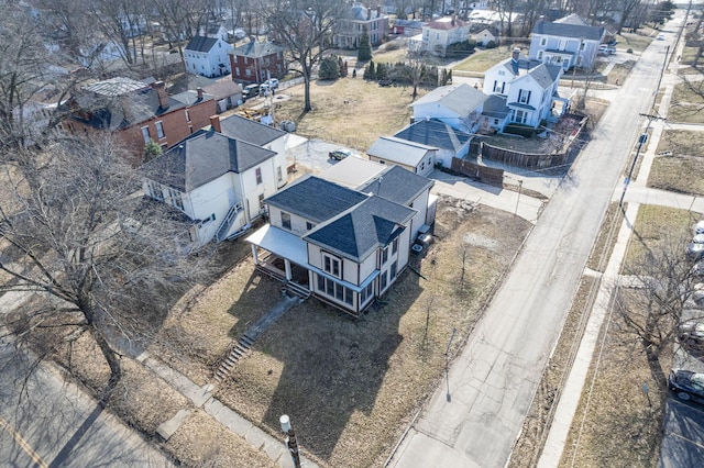 birds eye view of property with a residential view