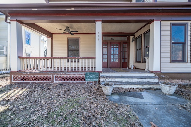 property entrance featuring covered porch and a ceiling fan