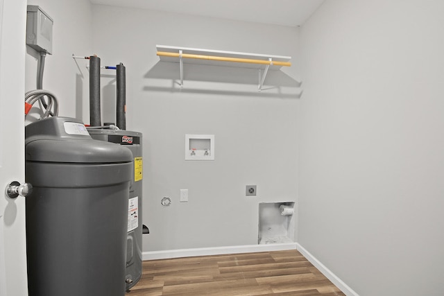 utility room featuring water heater