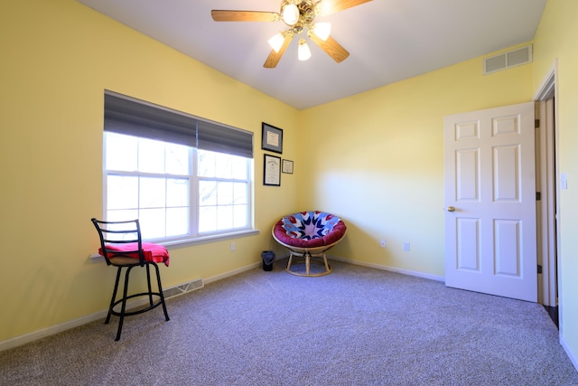 misc room with baseboards, visible vents, and carpet flooring